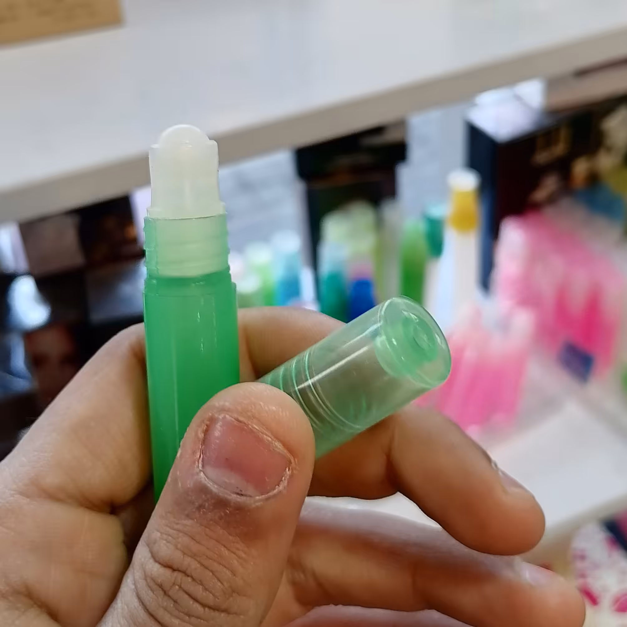 عطر اگزریوس رژ خالص غلتکی 