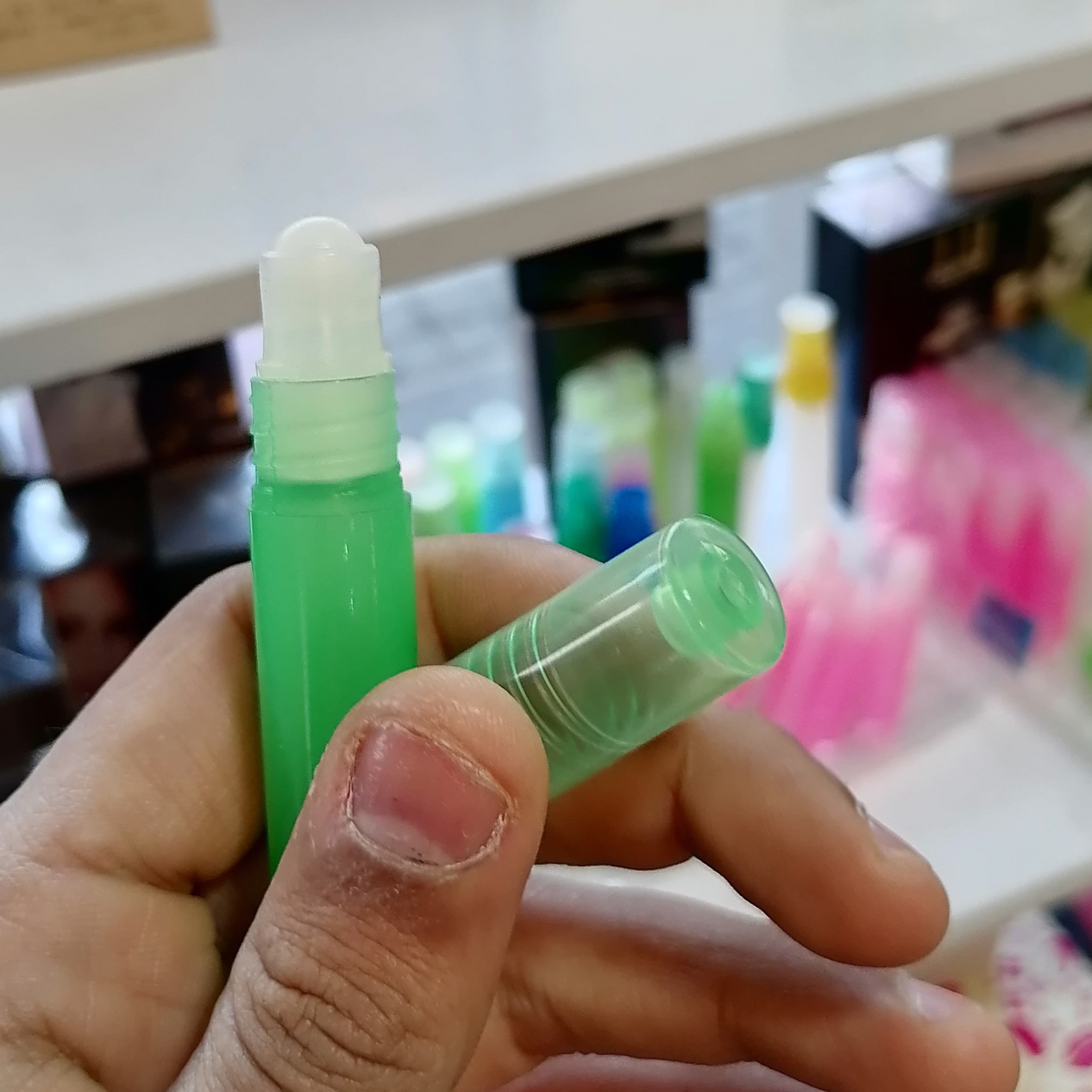 عطر اگزریوس رژ خالص غلتکی 